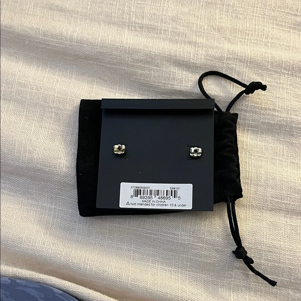 Coach Two-Tone Stud Earrings - Picture 2 of 3